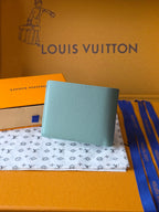 Light blue small bag wallet with Louis Vuitton monogram on front panel
