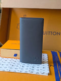 Small leather wallet in dark blue with Louis Vuitton logo embossed on front