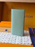 Light blue leather small bag with Louis Vuitton monogram on front panel