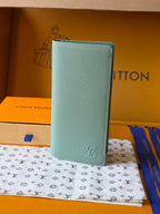 Light blue leather small bag with Louis Vuitton monogram on front panel