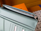 Light blue leather small bag with zipper compartment and silver metal hardware
