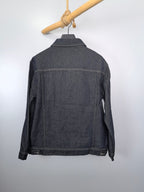 Moncler dark denim jacket back view with buttoned hem and standard shoulder seams