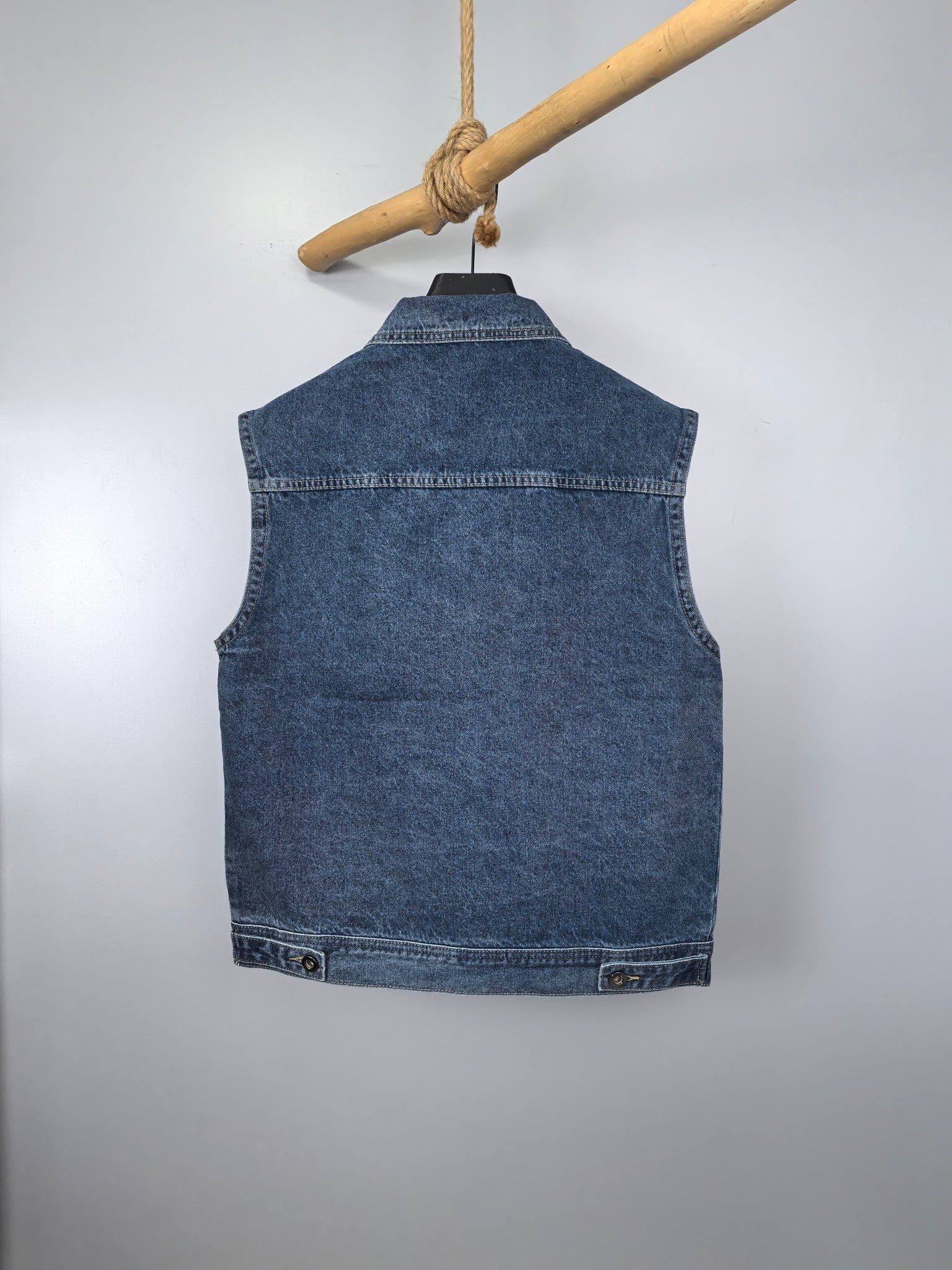 Burberry blue denim vest back view with high collar and buttoned hem