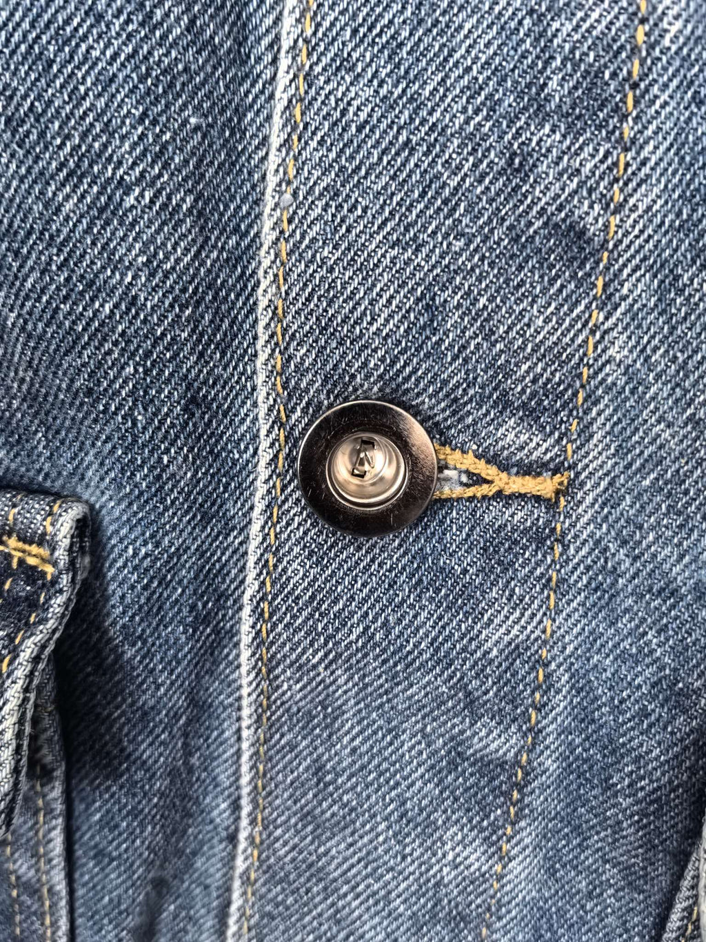 Burberry denim vest front button and stitched placket detail in blue wash