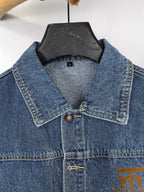 Burberry denim vest close-up of pointed collar and button placket