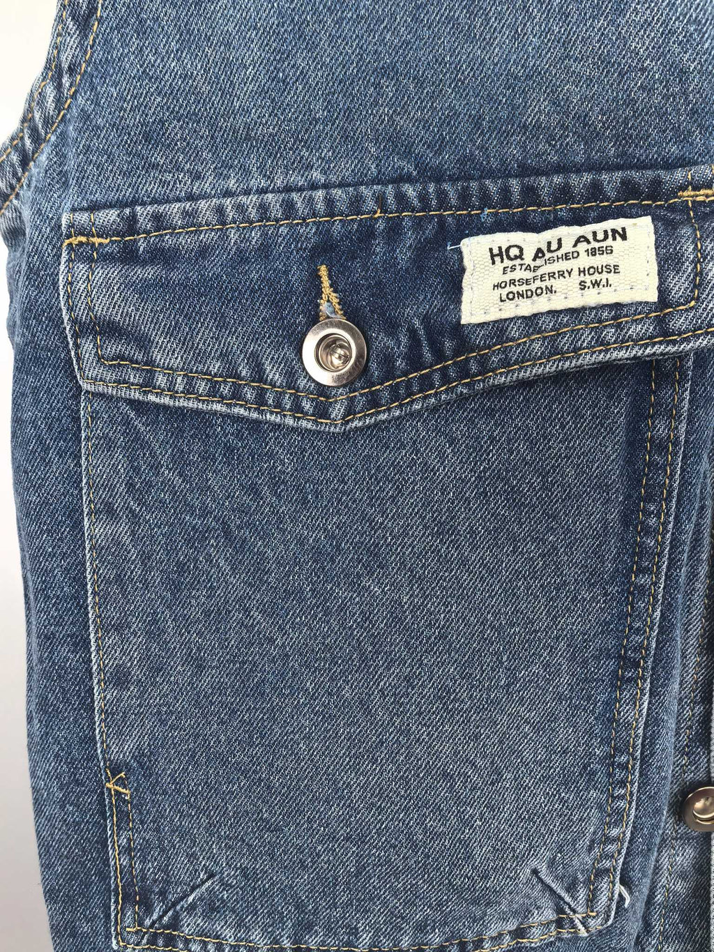 Burberry denim vest interior pocket label with barcode and brand details