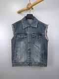 Gucci blue denim sleeveless jacket with button front and flap chest pockets