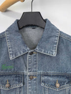 Gucci blue denim sleeveless jacket with pointed collar and buttoned flap pockets