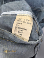 Gucci denim fabric care label tag stitched inside