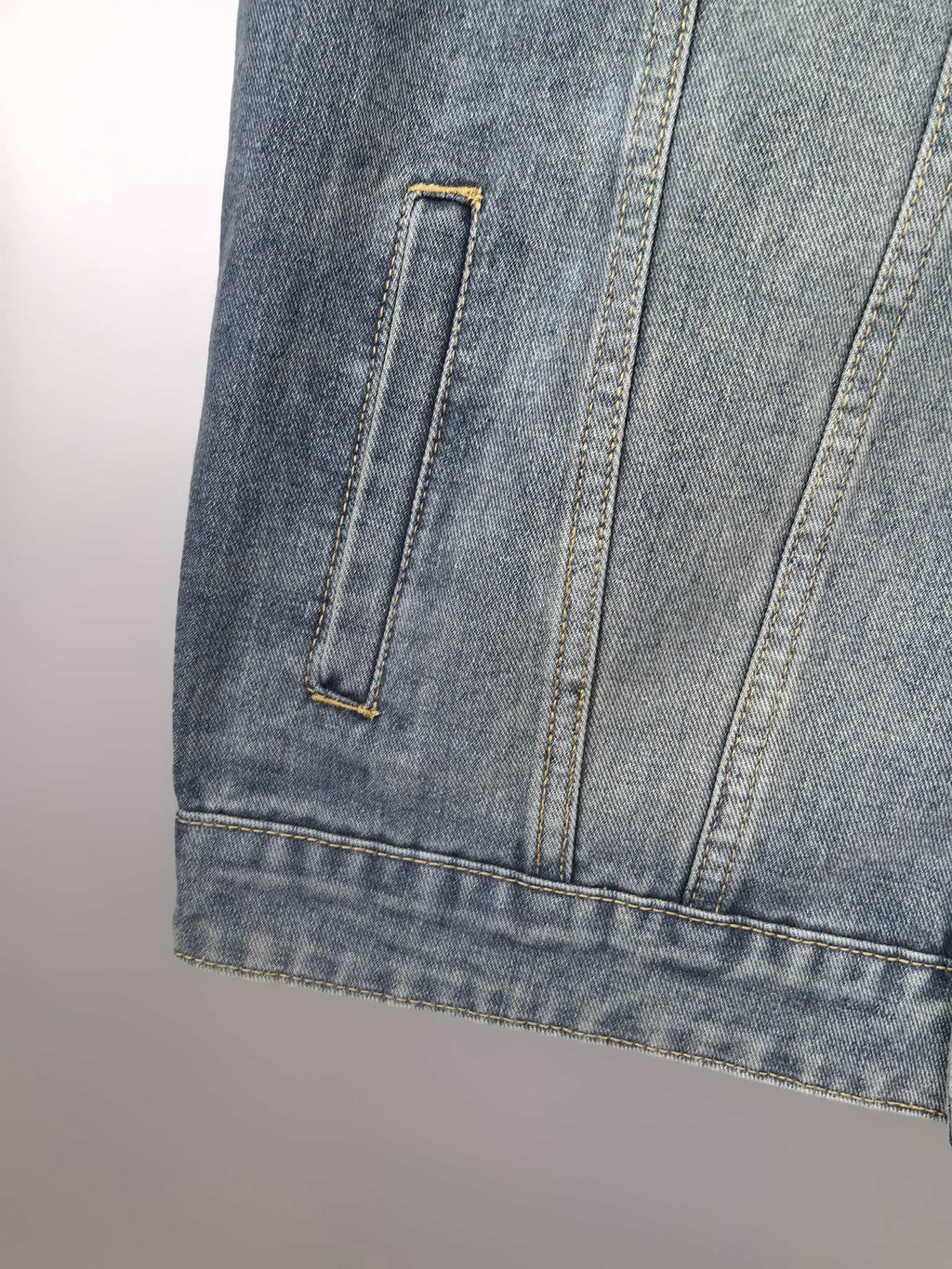 Gucci blue denim sleeveless jacket with side pocket and stitched hem