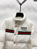 Gucci white puffer jacket front with button placket and striped band logo patch
