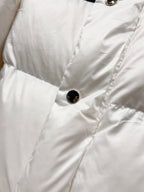 Gucci white puffer jacket front with snap buttons and quilted padding