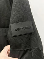 Louis Vuitton logo patch on dark gray fabric cuff