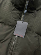 Puffer jacket front with zipper and hanging Louis Vuitton tag