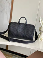 Louis Vuitton monogram duffel bag, dark navy with front vertical panel and strap