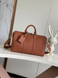 Brown leather structured handbag with top handles and crossbody strap, zipper front panels