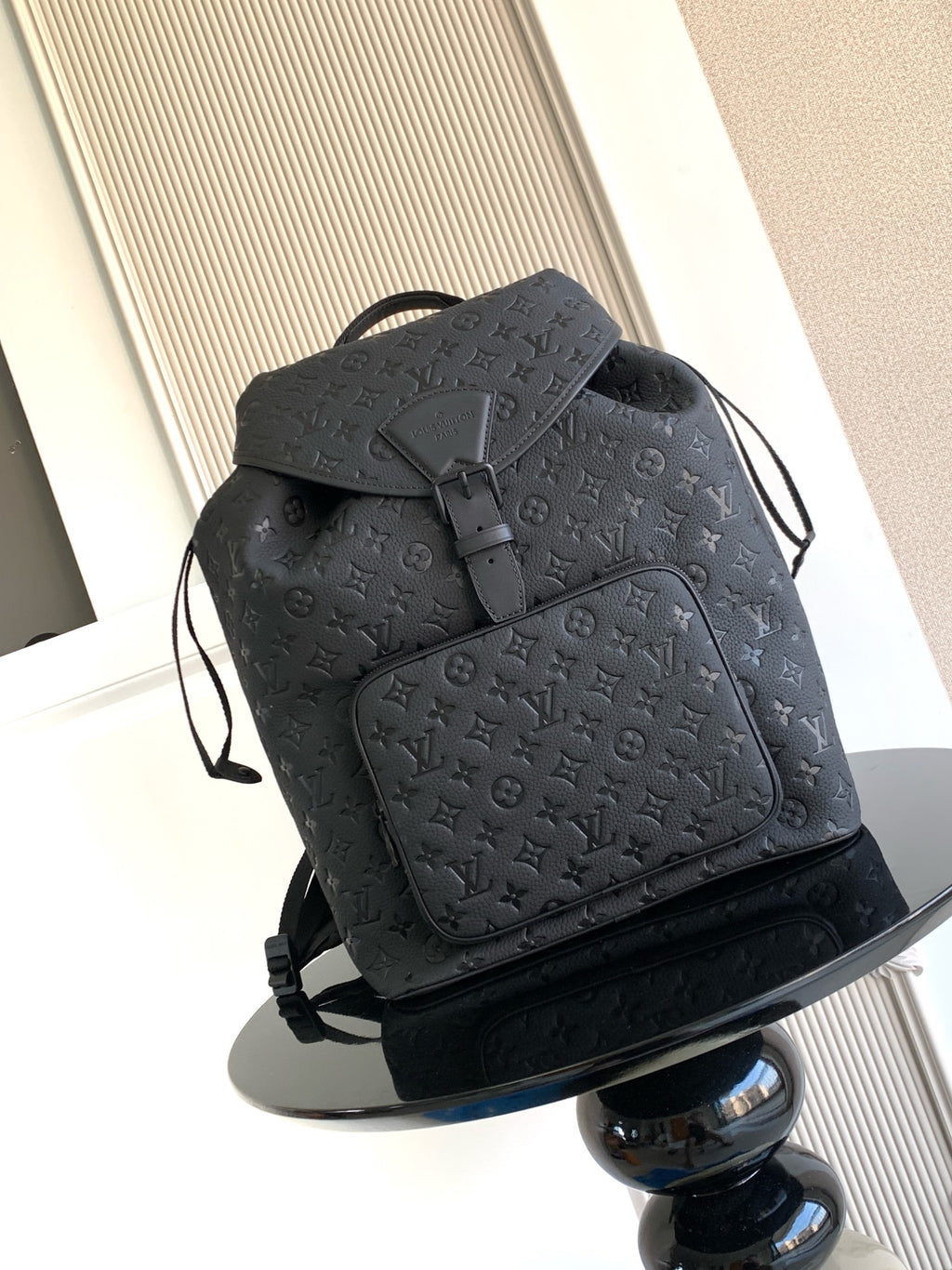 Louis Vuitton monogram backpack in dark gray/black with front flap and adjustable straps