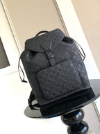 Louis Vuitton monogram backpack in dark gray/black with front flap and adjustable straps