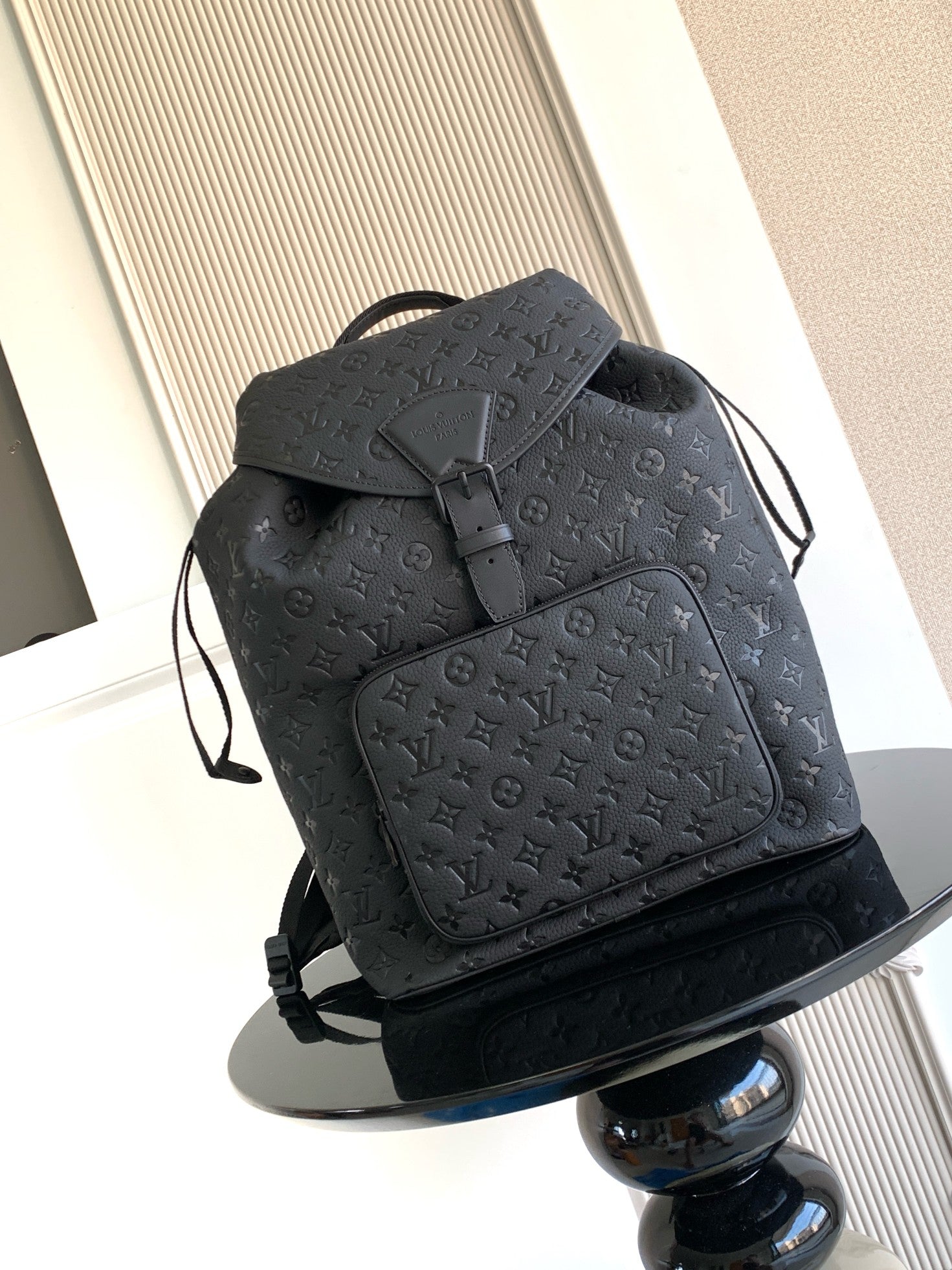Louis Vuitton monogram backpack in dark gray/black with front flap and adjustable straps