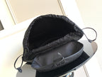 Louis Vuitton monogram backpack open top showing gray lining and drawstring cord
