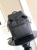 Louis Vuitton monogram backpack in dark gray with front flap and tie closure
