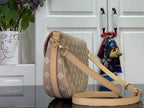 Louis Vuitton monogram crossbody bag with flap, tan leather strap and gold hardware