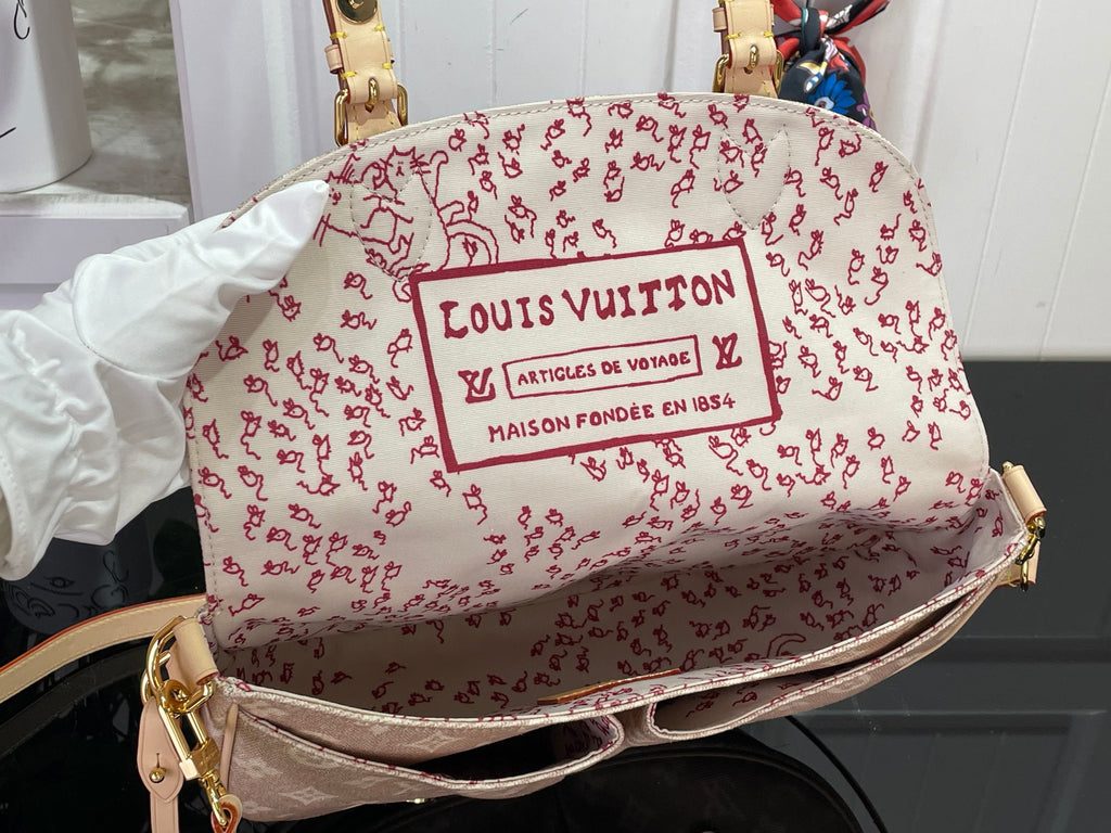 Louis Vuitton patterned shoulder bag in white with red logo print and top handle