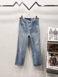 Light wash denim pants with straight legs, front button-and-zip fly, belt loops
