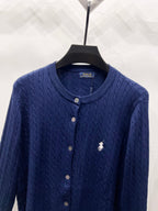 Navy blue knit cardigan with crew neck, button placket, and polo horse logo