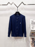 Navy blue knit cardigan with button front and small polo horse logo