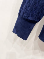 Navy blue knit cardigan sleeve and ribbed cuff hem detail