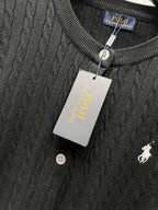 Ralph Lauren knit cardigan close-up with ribbed crew neck, white buttons, polo logo