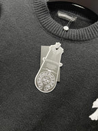 Black knit sweater collar with ribbed trim and small button closure detail