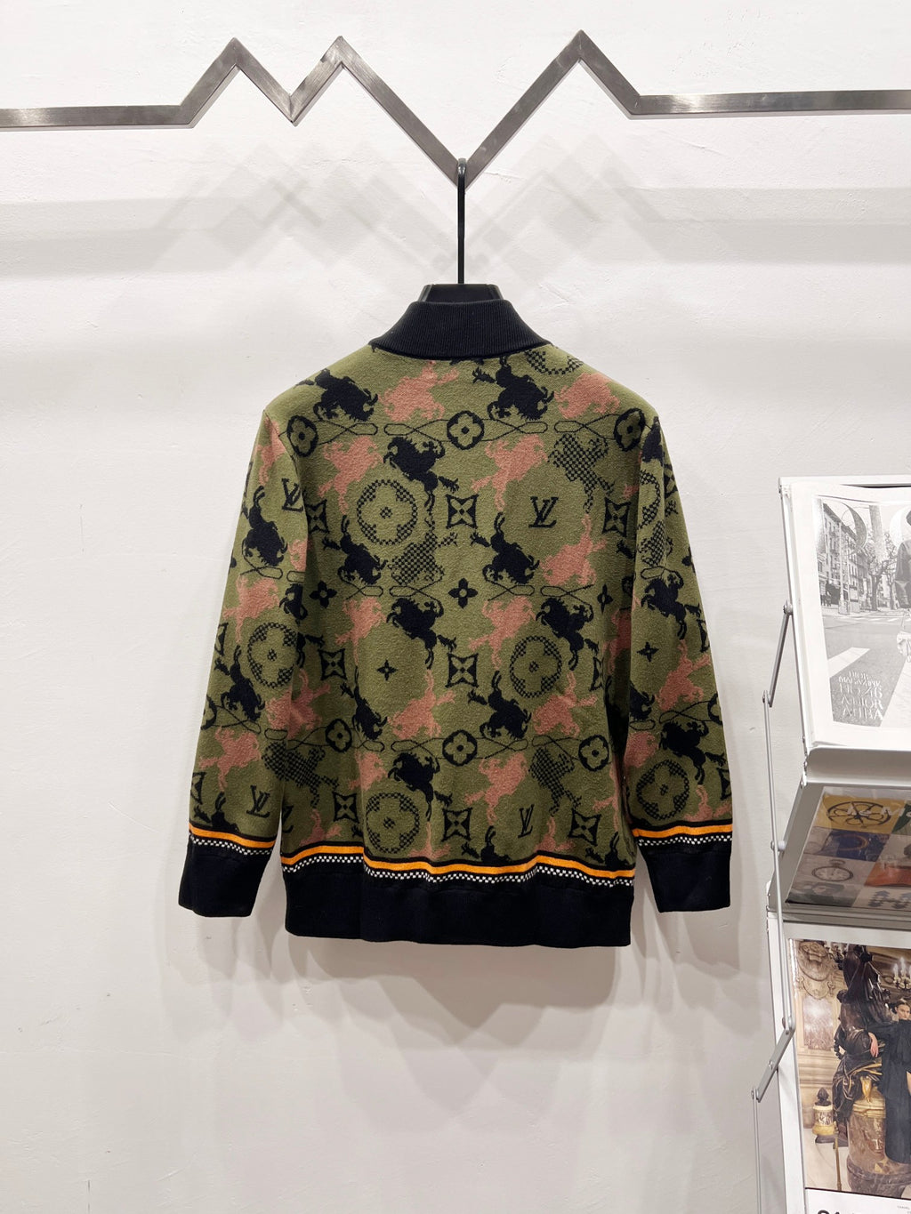 Zip-up jacket with multicolor monogram pattern and black ribbed cuffs