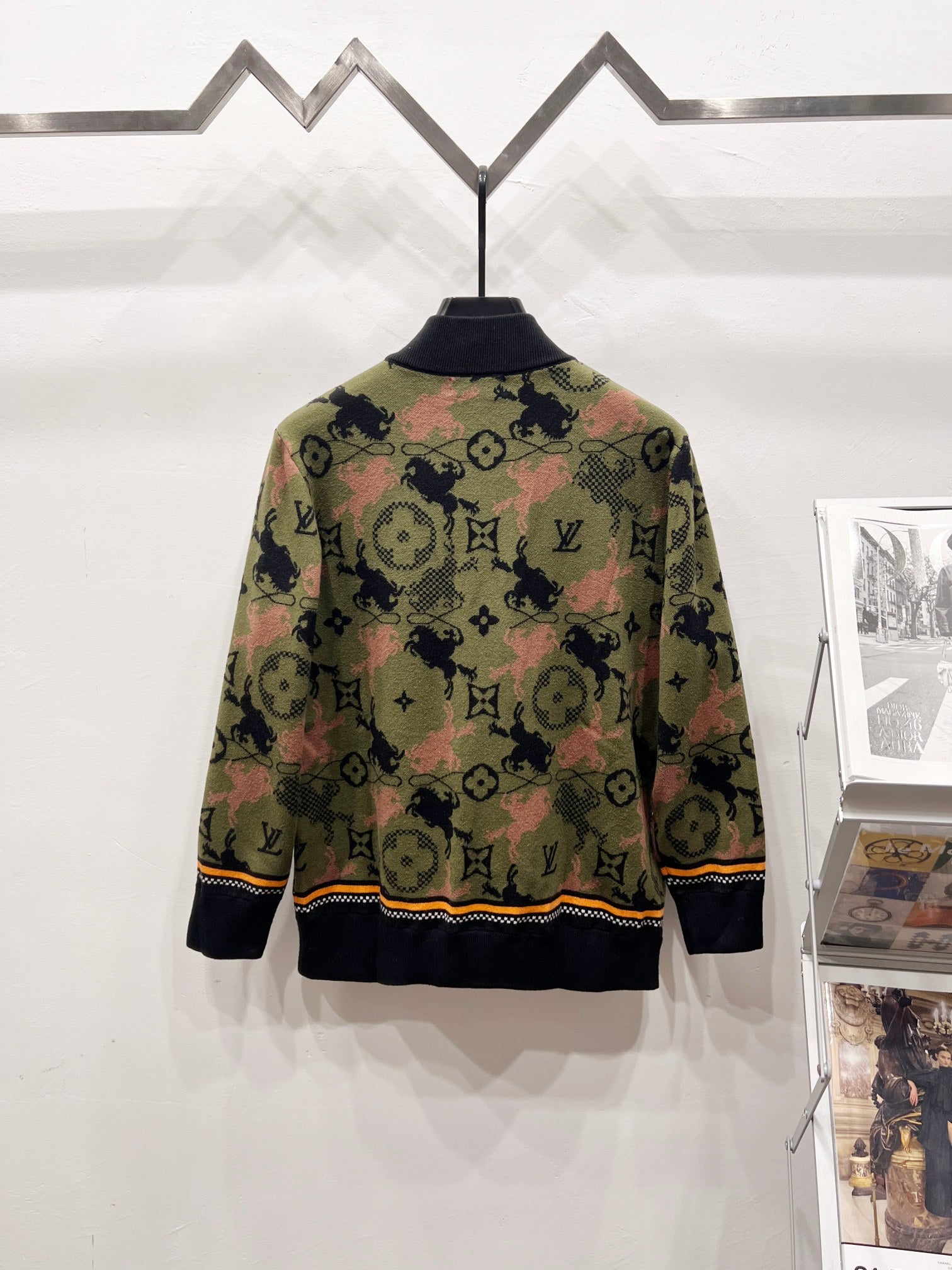 Zip-up jacket with multicolor monogram pattern and black ribbed cuffs