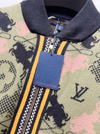 Zip-up jacket neck and zipper with gold pull and brand tag