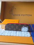 Louis Vuitton small bag in dark monogram canvas with pink zipper and cat patch