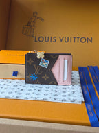 Small Louis Vuitton monogram wristlet pouch with multicolor patches and pink card slot