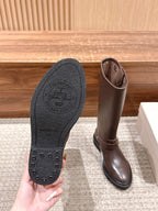 Golden Goose boot sole underside with tread pattern and dark rubber outsole