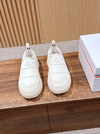 Moncler white slip-on sneakers, round toe, logo patch on side