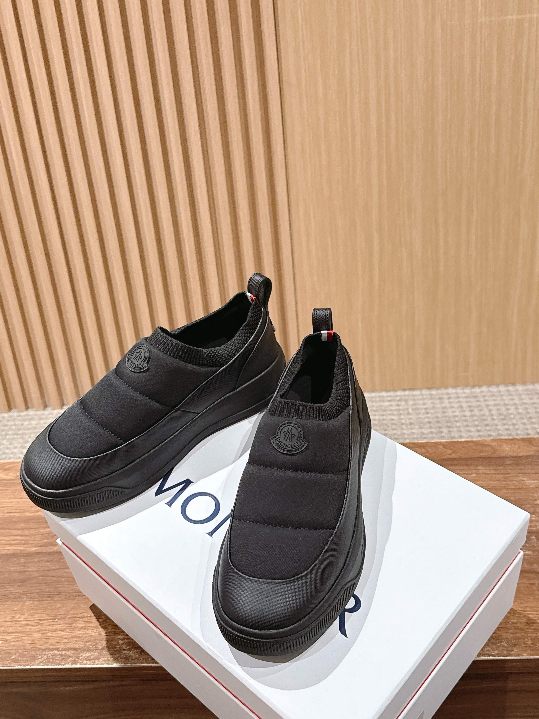 Moncler slip-on shoes, dark gray, with round logo patch on heel