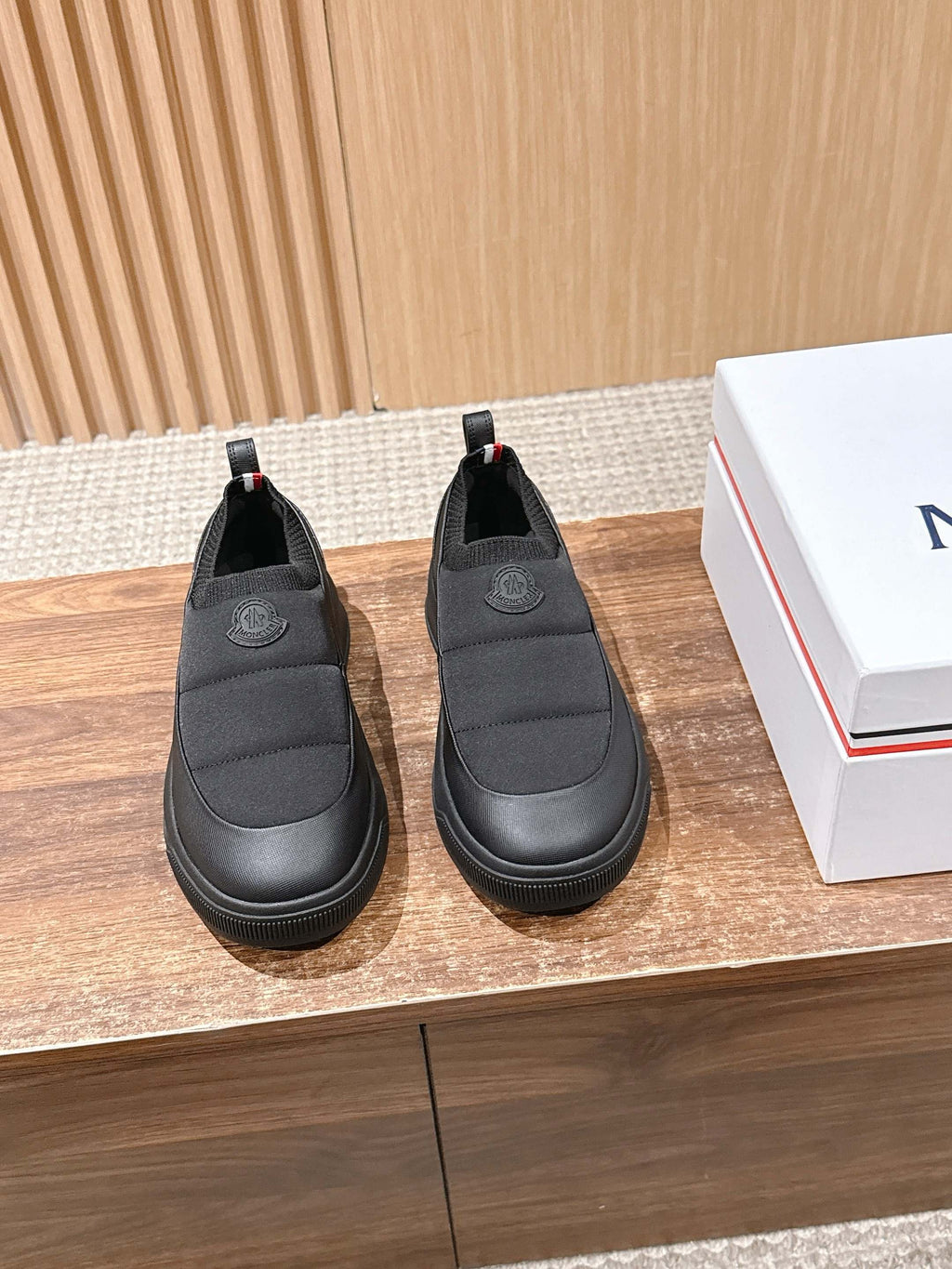 Moncler slip-on shoes in dark gray with elastic side panels and logo patch