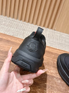 Moncler slip-on shoe heel in dark gray with logo patch and strap detail