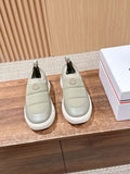 Moncler slip-on sneakers in light beige with ribbed side panels and cushioned sole