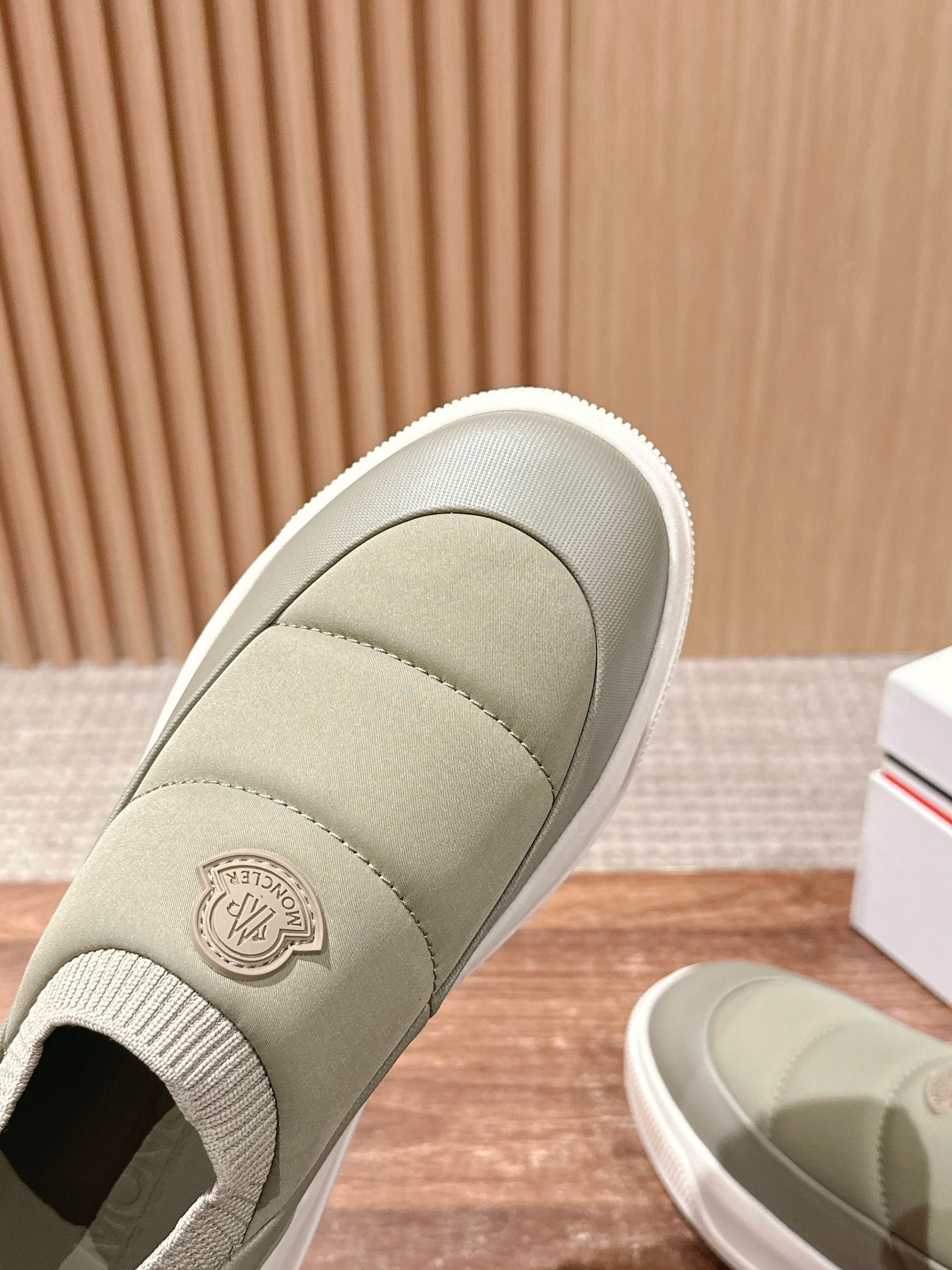 Moncler light beige slip-on sneaker with elastic collar and round logo patch on side