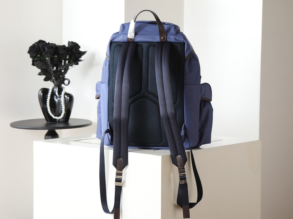 Prada blue nylon backpack rear view with back mesh panel and straps