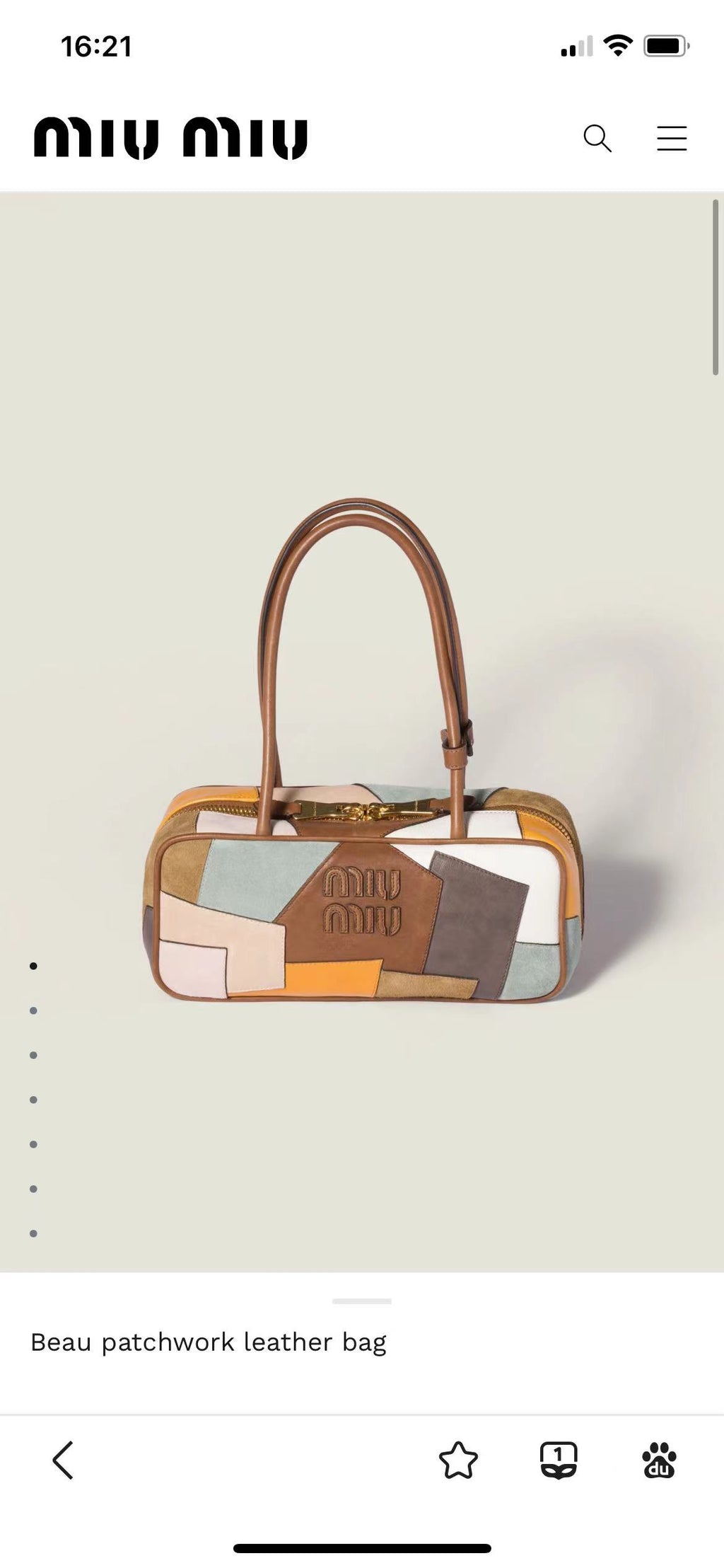 Patchwork leather bag product view with top handles, multicolor blocks, and central embossed logo patch.
