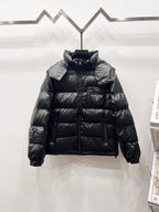 Black long puffer jacket with high collar, zip front, and quilted baffles