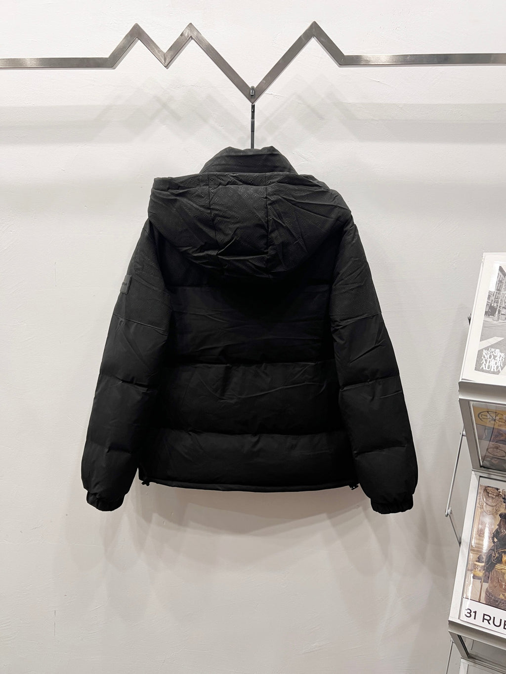 Hooded puffer jacket in dark gray, back view with full zip