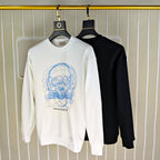 White and black crewneck sweatshirts with line skull graphic